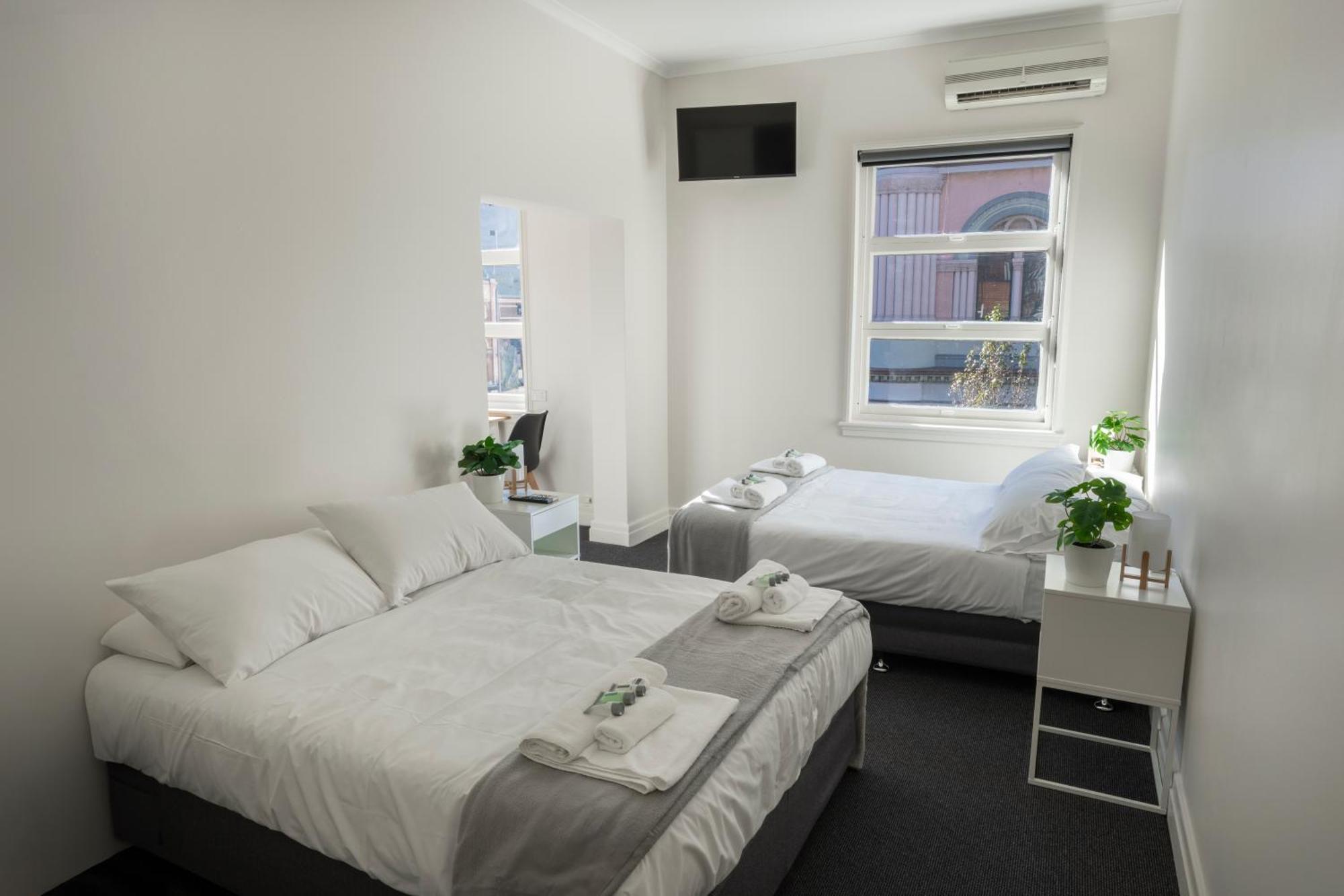 Camera Familiare con Bagno in Comune